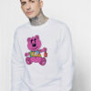 Joe Burrow wears Sorry in Advance's Pink Bear Sweatshirt